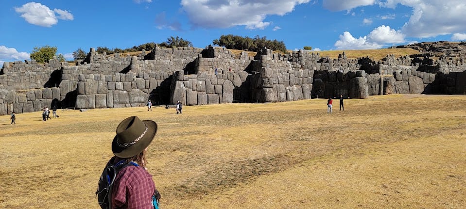 Sacsayhuaman megalithic walls with person for scale